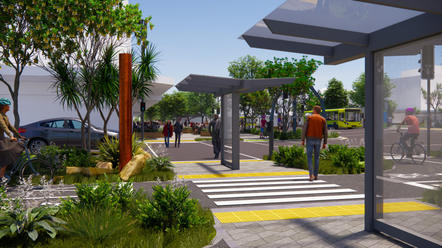 Imahe shows the new crossing between Cambridge and Kent Terraces. It is taken on the crossing, looking towards Napoli.  shoes the new weather shelters, has a person on a bike on the left and a person crossing the pedestrian crossing. 